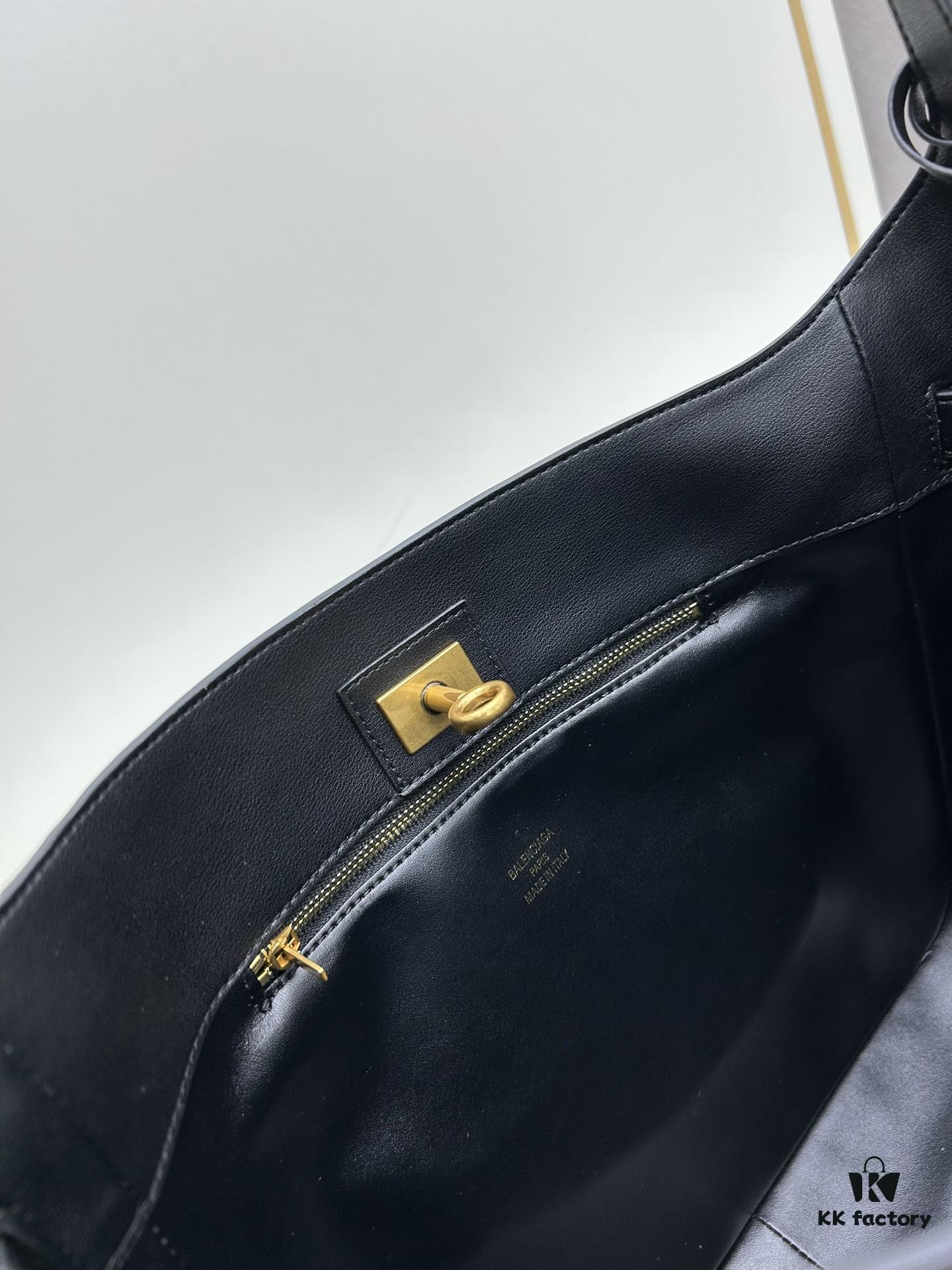 New Balenciaga Winter 24 Collection Re-see Handbag, Shoulder Bucket Bag in Full-Grain Leather, Minimalist Luxury Design Upcycled from Motorcycle Gloves with Keychain Closure, Effortlessly Chic Oversized Look