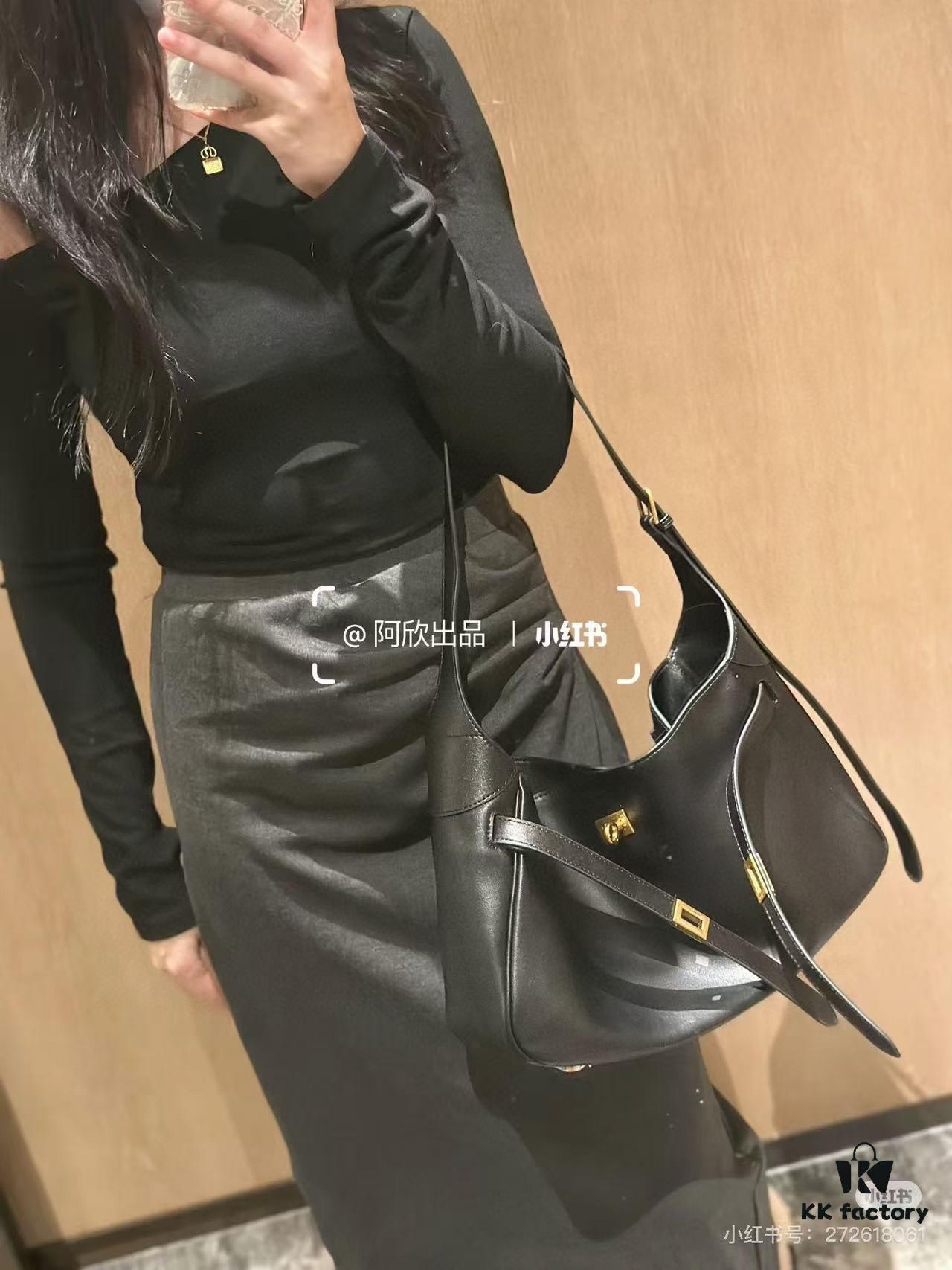 New BALENCIAGA Winter 24 Collection Re-See Shoulder Bucket Bag, Full-Grain Leather, Minimalist Luxury Design, Upcycled Motorcycle Glove Clutch with Keychain Closure, Effortlessly Chic Oversized Look