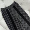 1V 25ss New Arrival Track Pants Crafted from Lustrous Technical Fabric, Showcasing the 2025 Spring-Summer Runway Trend. Flocked Matte Damier Pattern Features the Marque L.Vuitton Déposée Logo, with Velvet Trims Adding Textural Depth, Perfectly Paired with Matching Top for a Sharp, Cohesive Look
