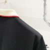 GUCCI Men's Polo Shirt with Notched Lapel, Color-Blocked Collar, and Embroidered GG Logo