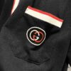 GUCCI Men's Polo Shirt with Notched Lapel, Color-Blocked Collar, and Embroidered GG Logo