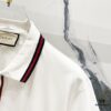 GUCCI Men's Polo Shirt with Lapel, Embroidered Logo, Color-Block Striped Pocket Design