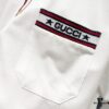 GUCCI Men's Polo Shirt with Lapel, Embroidered Logo, Color-Block Striped Pocket Design