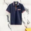 GUCCI Men's Polo Shirt with Lapel, Embroidered Logo, Color-Block Striped Pocket Design