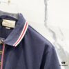 GUCCI Men's Polo Shirt with Lapel, Embroidered Logo, Color-Block Striped Pocket Design