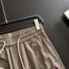 GUCCI 2025 Spring/Summer New Elastic Waist Casual Pants, Lightweight Custom Counter Fabric, Breathable and Comfortable, Exquisite Details, Brand Design Concept, High-Quality Craftsmanship, Soft and Smooth Texture, Leisure Cut with Excellent Fit