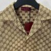Gucci 25SS New Arrival Letter Interlocking Pattern Shirt Inspired by Founder Guccio Gucci's Name, Crafted in GG Canvas with Side Slits