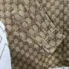 Gucci 25SS New Arrival Letter Interlocking Pattern Shirt Inspired by Founder Guccio Gucci's Name, Crafted in GG Canvas with Side Slits