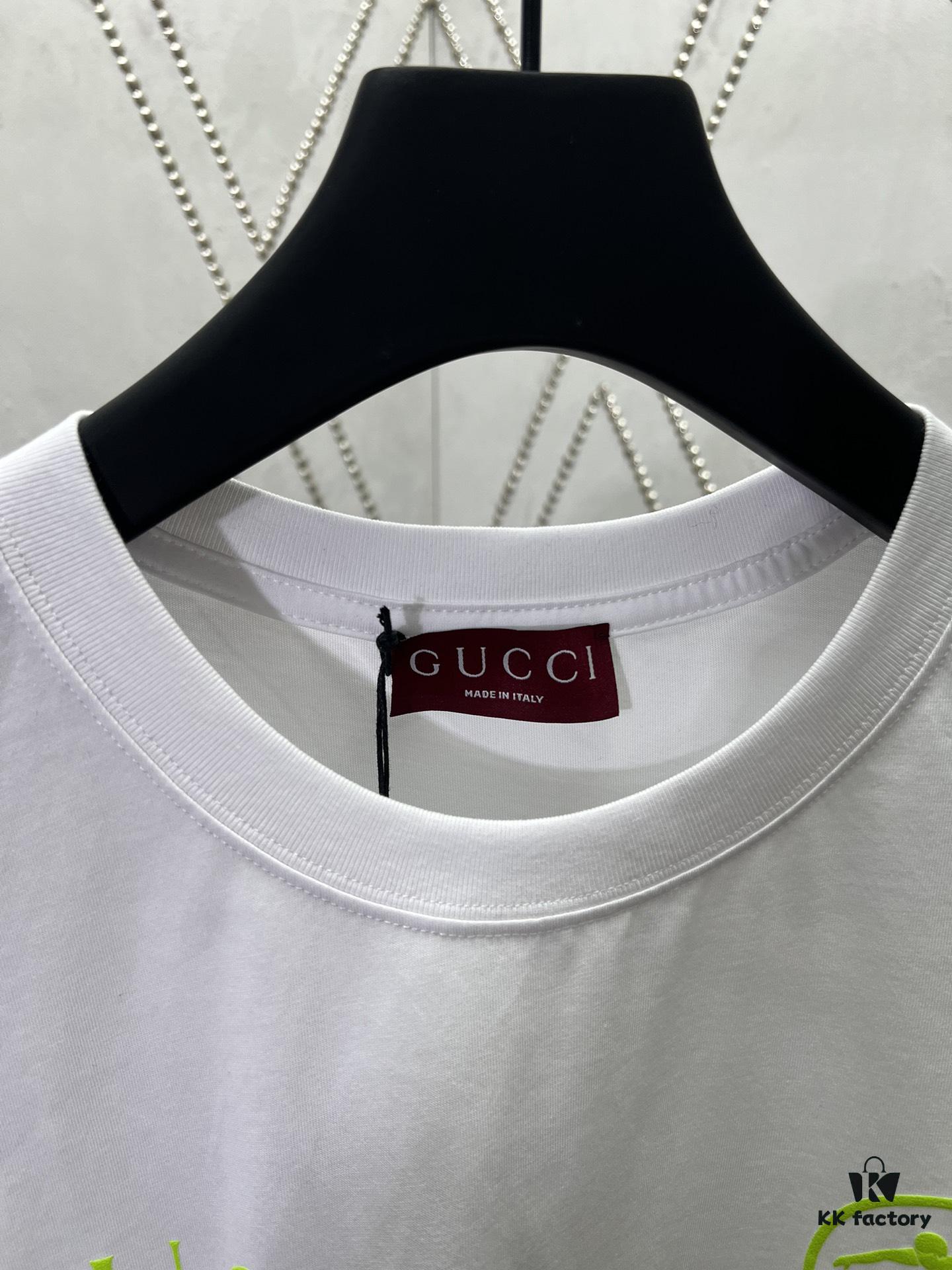 Gucci 25SS New Arrival Oversized T-Shirt Crafted from Garment-Dyed Knit Cotton, Featuring Gucci Logo Print on the Front and Gucci Surfer Print on the Back