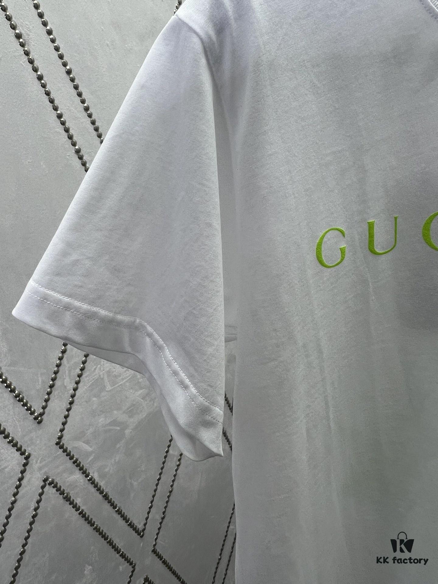 Gucci 25SS New Arrival Oversized T-Shirt Crafted from Garment-Dyed Knit Cotton, Featuring Gucci Logo Print on the Front and Gucci Surfer Print on the Back