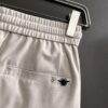 DIOR 2025 Spring/Summer New Arrival Elastic Waist Casual Pants, Lightweight Custom Counter Fabric, Highly Breathable and Comfortable, Exquisite Details, Brand-Inspired Design Concept, Premium Quality, Soft and Smooth Texture, Excellent Fit with Relaxed Tailoring