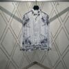 Dior 25SS New Arrival Shirt from the DIOR AND HYLTON NEL Collaboration Collection, Interpreting the Artist's Artistic Vision. Crafted from White Mulberry Silk Twill, Featuring an Oversized Silhouette and Concealed Button Closure. Stylish Design Perfectly Matches Other Pieces from This Limited Series