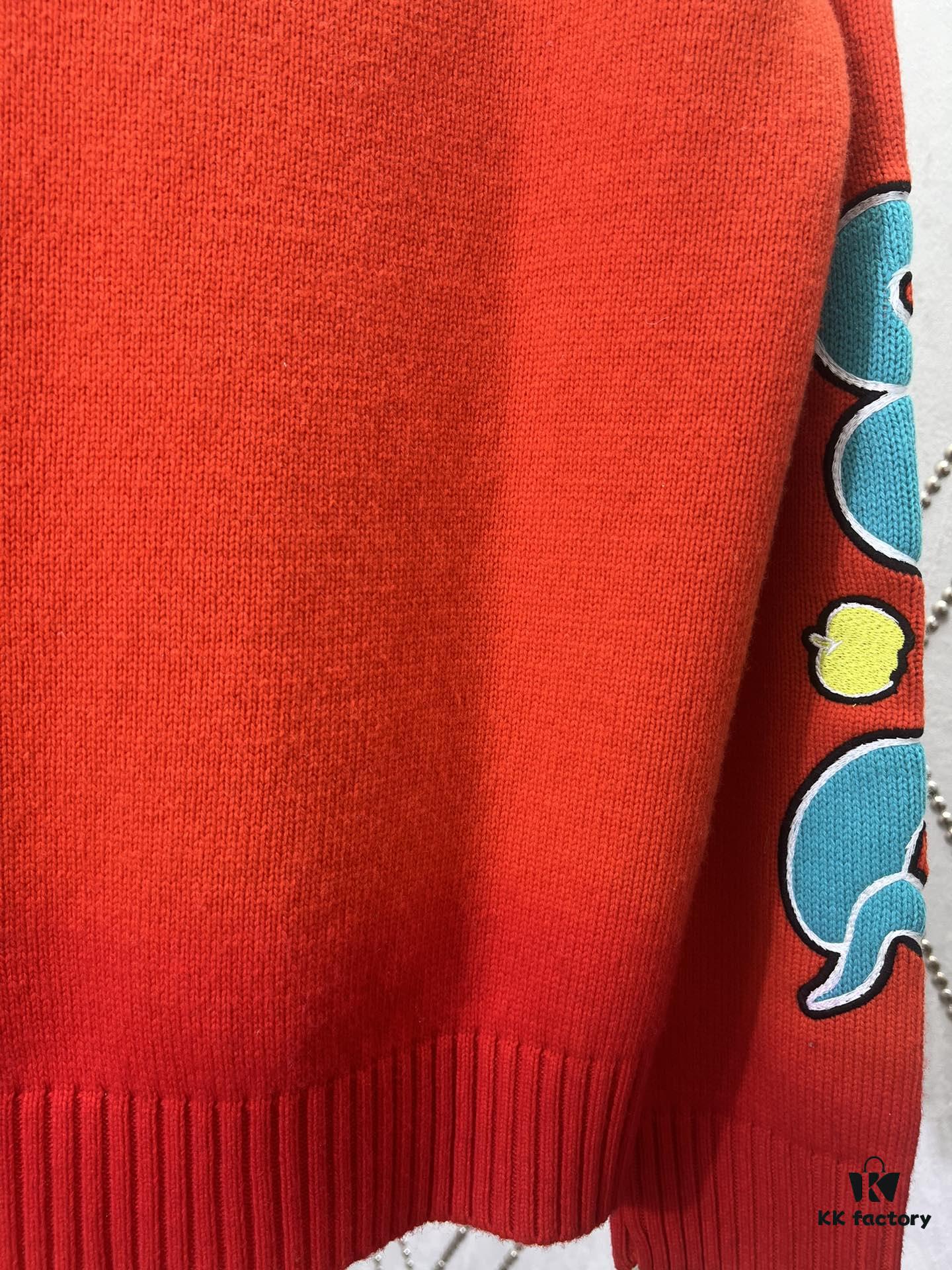 DIOR 25SS New Arrival Knitwear from the DIOR AND KAWS Limited Collection. Crafted from red and burgundy wool knit fabric, one sleeve features the DIOR AND KAWS signature embroidery, reinterpreting the Dior logo with a vibrant serpentine motif. The hem and cuffs feature contrasting details, perfect for pairing with classic jeans or shorts to create a striking look.