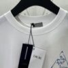 Dior 25SS New Arrival T-Shirt Featuring Signature Motifs from the Dior and Hylton Nel Collaboration Collection This Season. Crafted from Premium White Cotton Jersey, This Classic Silhouette Boasts a Ribbed Round Neckline, with Striking Contrast Prints on Both Front and Back for Elevated Style. Designed with a Relaxed Fit, Perfectly Paired with Sweatpants or Jeans.