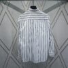 Dior 24SS New Arrival Shirt Featured in Dior's Winter 2024 Men's Collection Show, Fashionably Tailored to Highlight Workwear Aesthetics, Crafted from Blue Striped Cotton Fabric with a Christian Dior Couture Embroidered Chest Pocket, Oversized Fit for a Casual Style