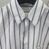 Dior 24SS New Arrival Shirt Featured in Dior's Winter 2024 Men's Collection Show, Fashionably Tailored to Highlight Workwear Aesthetics, Crafted from Blue Striped Cotton Fabric with a Christian Dior Couture Embroidered Chest Pocket, Oversized Fit for a Casual Style