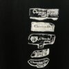 Dior 25SS New Arrival T-Shirt Featuring Dior Archives Labels in 3D Embossed Design, Made from Black Cotton Poplin Knit, Relaxed Fit with Flocked Logo on Chest, Unisex Style Ideal for Pairing with Wide-Leg Shorts