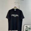 PRAD* Prada 25s New Arrival T-Shirt, Unisex Design, Innovative Embroidered and Heat-Transfer Graphic with Double-Layer Craft, Full-Dimensional Texture, Iconic Brand Lettering Front and Inverted Triangle Logo Back, Striking LOGO Visual Impact, 280g Pure Cotton Fabric, Soft and Comfortable, Extremely Stylish, Triple Tags Attached