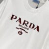 Prada 25SS New Arrival Round Neck T-Shirt! Must-Have for Trendsetters! Custom 3D Rubber Logo on Chest, Classic Colors with Stylish Appeal, Youthful and Vibrant Look! Crafted from 280g High-Quality Cotton, Exceptionally Comfortable to Wear and Touch, Smooth and Premium Feel!