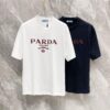 Prada 25SS New Round Neck T-Shirt! Must-Have for Fashion Enthusiasts! Custom 3D Rubber Logo on Chest, Classic Colors with Stylish Appeal, Youthful and Vibrant Design. Crafted from 280g High-Quality Cotton for Exceptional Comfort and Soft, Textured Handfeel.