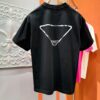 PRADA 2025 Spring/Summer New Short Sleeve T-Shirt! Runway-Inspired Fashion Casual Tee with Signature Logo Design! Premium 260g 100% Cotton Fabric, Soft and Skin-Friendly Texture, Exceptional Comfort and Breathability. A Gender-Neutral Unisex Style for Couples, Redefining Contemporary Fashion Elegance. Distinguished from Market Versions  ️ High-End Collection!