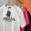 PRADA 2025 Spring/Summer New Arrival Short Sleeve T-Shirt! Runway-Inspired Fashion Casual Tee with Signature Logo Design! Premium 260g 100% Cotton Fabric, Soft and Skin-Friendly Texture, Exceptional Comfort and Breathability – Truly Irresistible in Person! Gender-Neutral Unisex Style for Couples, Redefining Contemporary Fashion Elegance! Distinguished from Standard Market Versions  ️ High-End Collection!