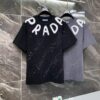 25ss PRADA Hand-Painted Logo T-Shirt Inspired by 80s Retro Style