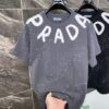 25ss PRADA Hand-Painted Logo T-Shirt Inspired by 80s Retro Style