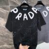25ss PRADA Hand-Painted Logo T-Shirt Inspired by 80s Retro Style