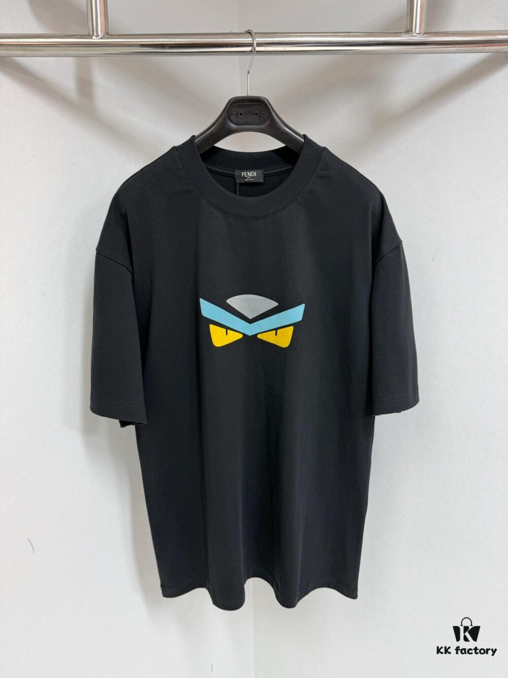 FENDI Round-Neck Short-Sleeve T-Shirt with Eye Print, Pure Cotton Fabric Featuring Gold Snake-Eye Design and Lettering Logo, Mother-of-Pearl Buttons