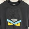 FENDI Round-Neck Short-Sleeve T-Shirt with Eye Print, Pure Cotton Fabric Featuring Gold Snake-Eye Design and Lettering Logo, Mother-of-Pearl Buttons