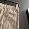 Moncler 2025 Spring and Summer New Arrival Elastic Waist Casual Pants, Lightweight Exclusive Cabinet Custom Fabric, Highly Breathable and Comfortable, Exquisite Details, Brand-Oriented Design Concept Reflecting High Quality, Soft and Smooth Texture, Showcasing a Stylish Relaxed Cut with Excellent Fit