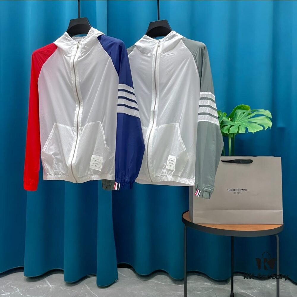 THOM BROWNE ➡️ Tom Brown Sun Protection Jacket, Summer Classic Color-Blocked Four-Stripe Lightweight Breathable Hooded Skin Coat