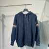 THOM BROWNE Fall 2024 New Arrival Tricolor Sleeve Stripe Colorblock Zipper Knit Hooded Jacket, Classic TB Logo Zip-Up Cardigan, Rich and Textured Overall Color, Wool Blend Fabric with Soft Comfort, Contrasting Stripes Add Design Flair – Stylish, Unique, and Versatile Hooded Zip-Up Outerwear