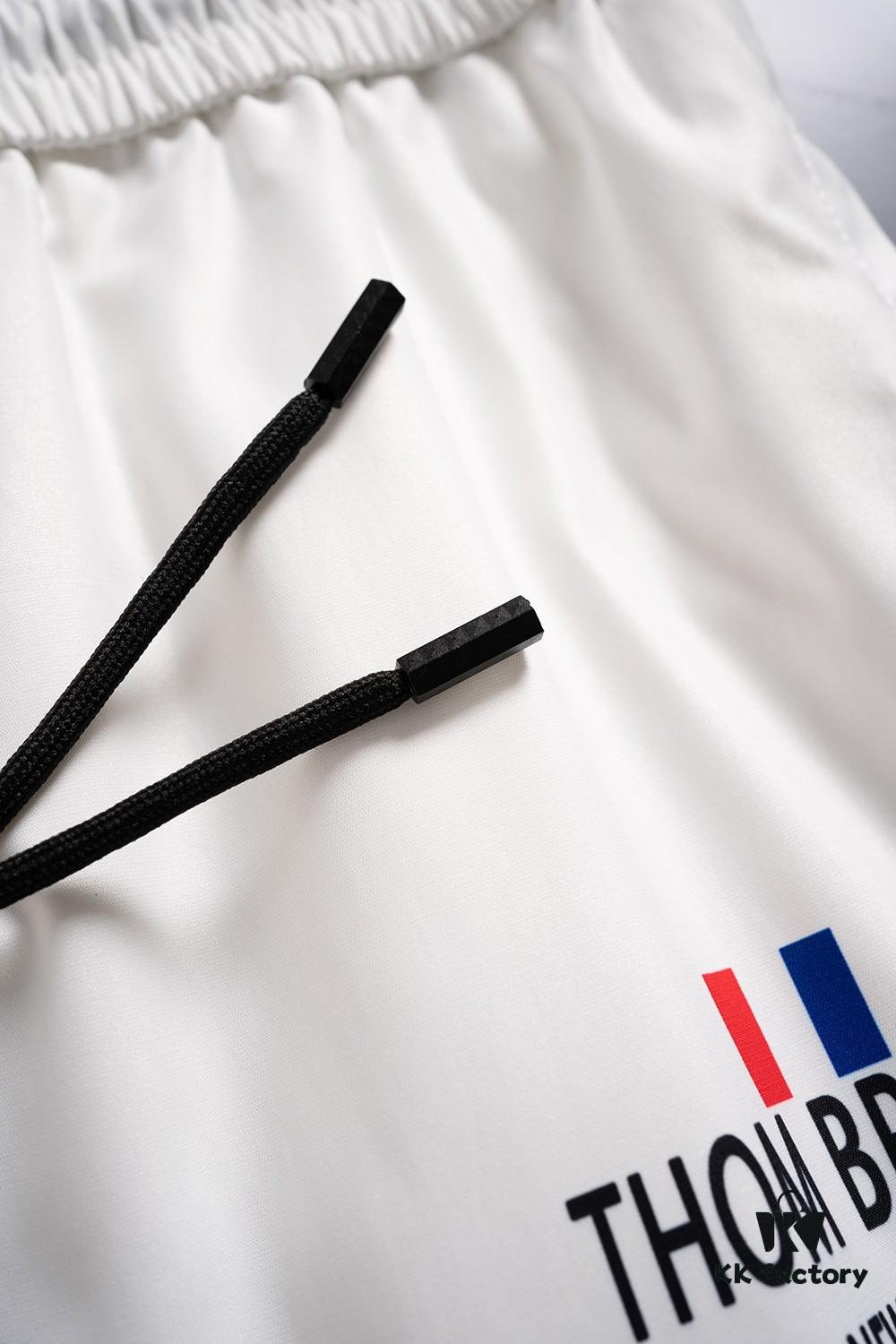 THOM BROWNE 2025 Spring and Summer New Arrival High-Quality Casual Quick-Dry Woven Beach Pants, 3D Digital Print, Premium Reproduction with Latest Embossed Logo Design, Ideal for Urban Fashion, Travel, and Leisure