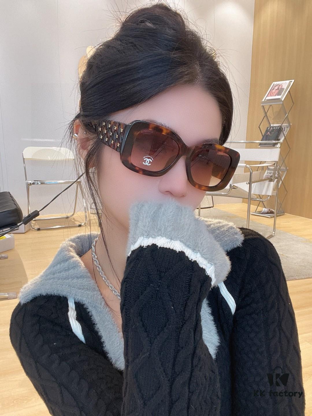 CHANEL New Classic Black and White Sunglasses with Logo-Embellished Temples