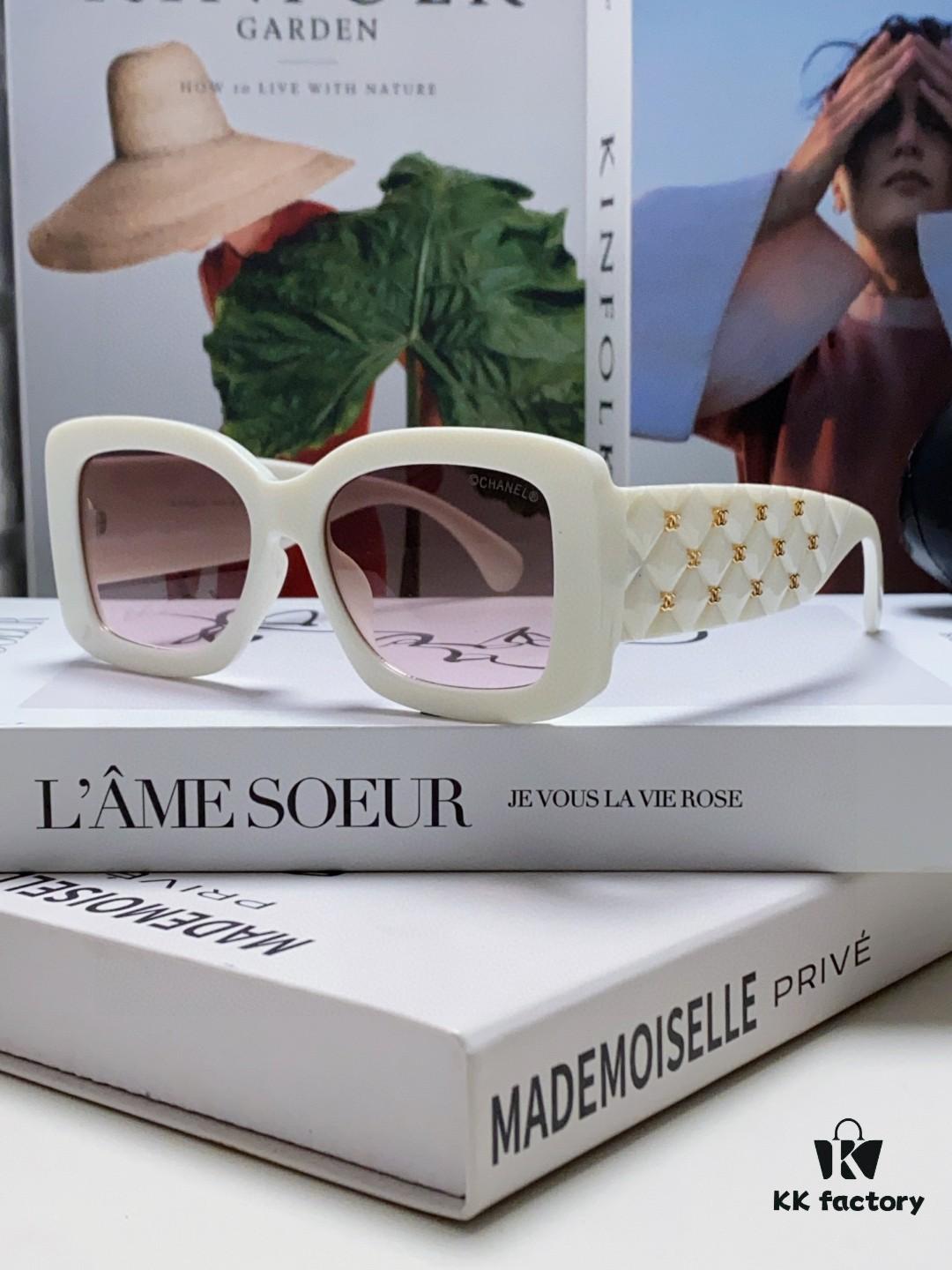 CHANEL New Classic Black and White Sunglasses with Logo-Embellished Temples