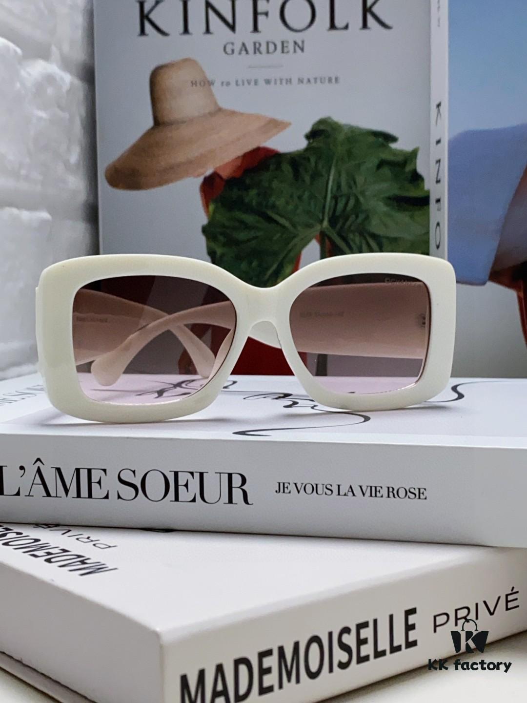 CHANEL New Classic Black and White Sunglasses with Logo-Embellished Temples