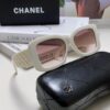 CHANEL New Classic Black and White Sunglasses with Logo-Embellished Temples