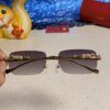 Cartier 2025 New Arrival Official Website 1:1 Minimalist Luxury Sunglasses with Iconic Leopard Logo on Temple
