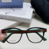 Gucci 2025 New Arrival Women's Woven Art Close-up Frame Black Fashion Sunglasses with Classic Red and Green Band