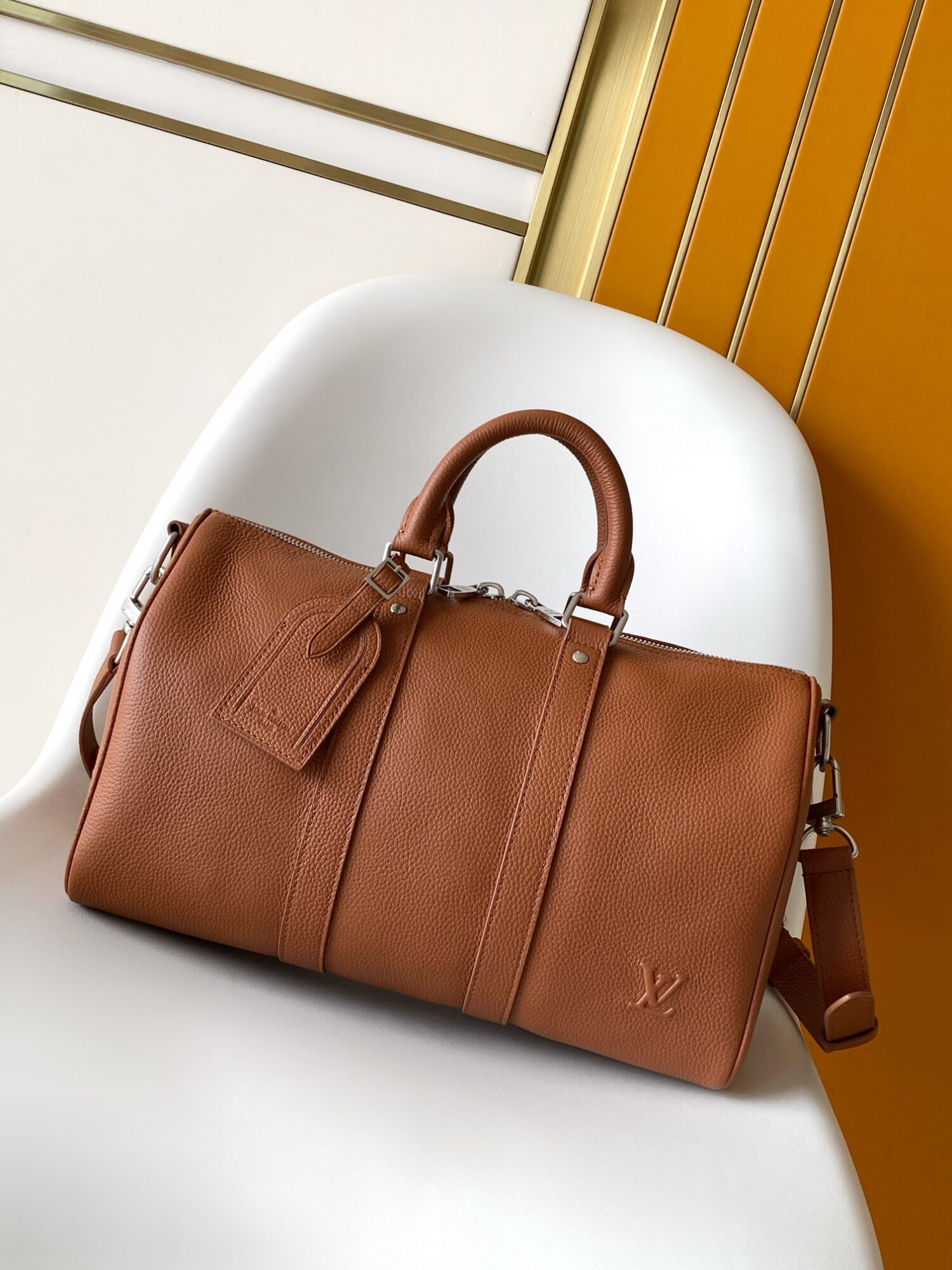 Louis Vuitton Keepall Bandoulière 35 Bag — This practical and versatile Keepall Bandoulière