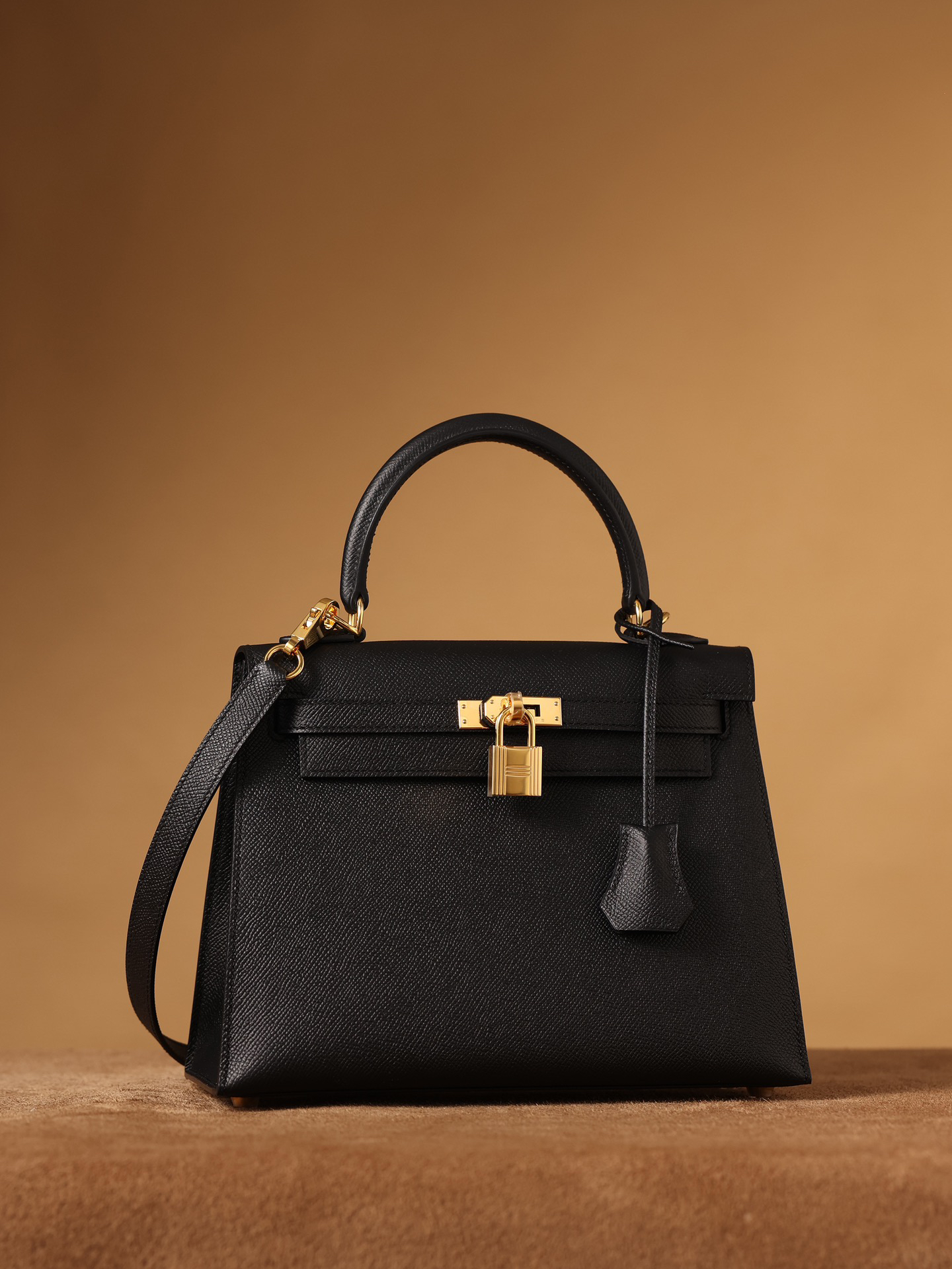 Hermes Kelly bag, black, 25cm, with gold hardware.