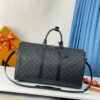 Louis Vuitton The Keepall 50 travel bag, crafted from the new, iconic black and grey Monogram Eclipse canvas.