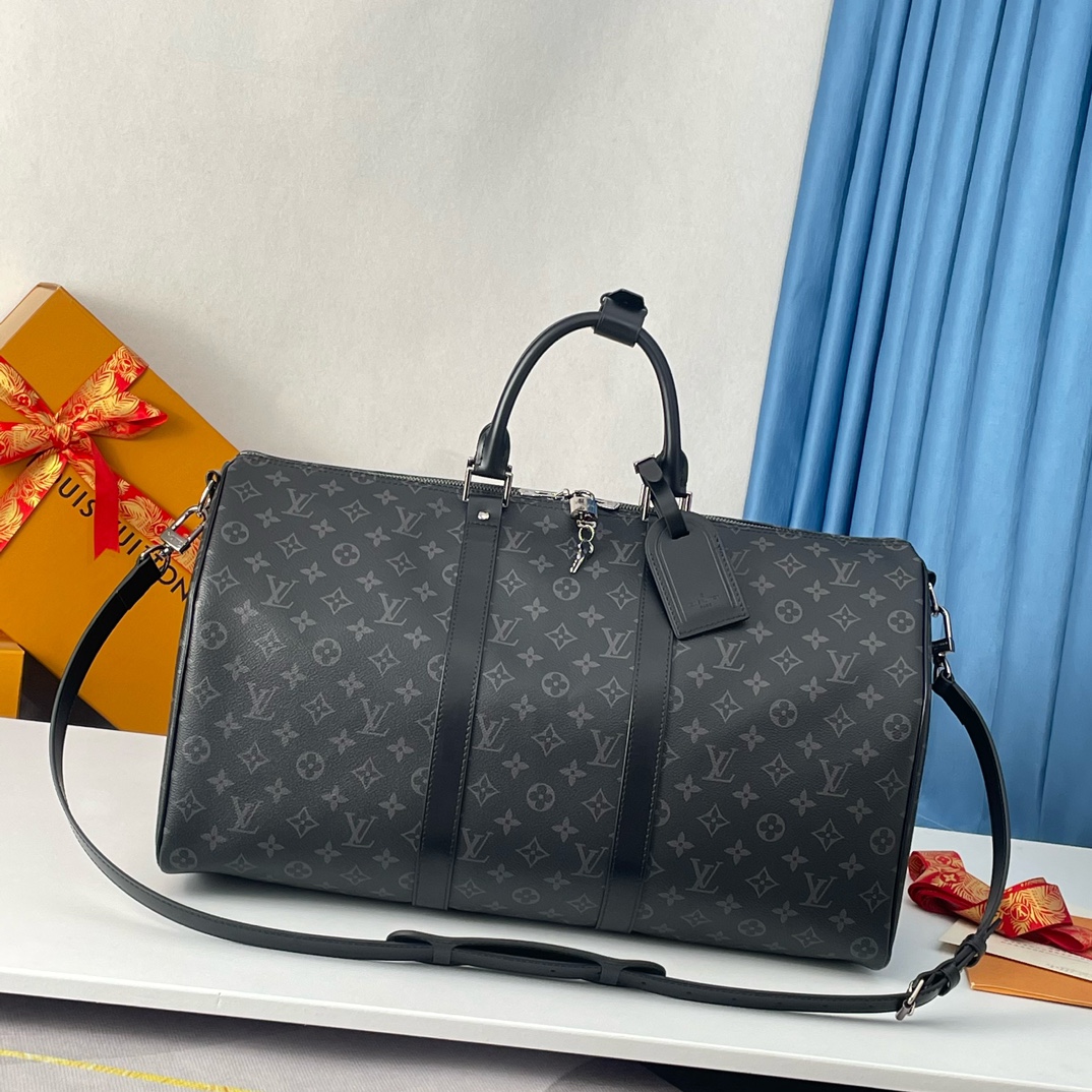 Louis Vuitton The Keepall 50 travel bag, crafted from the new, iconic black and grey Monogram Eclipse canvas.