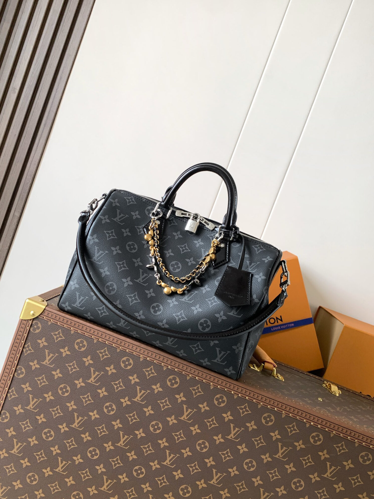 Louis Vuitton This Speedy Soft 30 handbag, part of the Ski Collection, reimagines the classic design in Monogram Eclipse canvas.