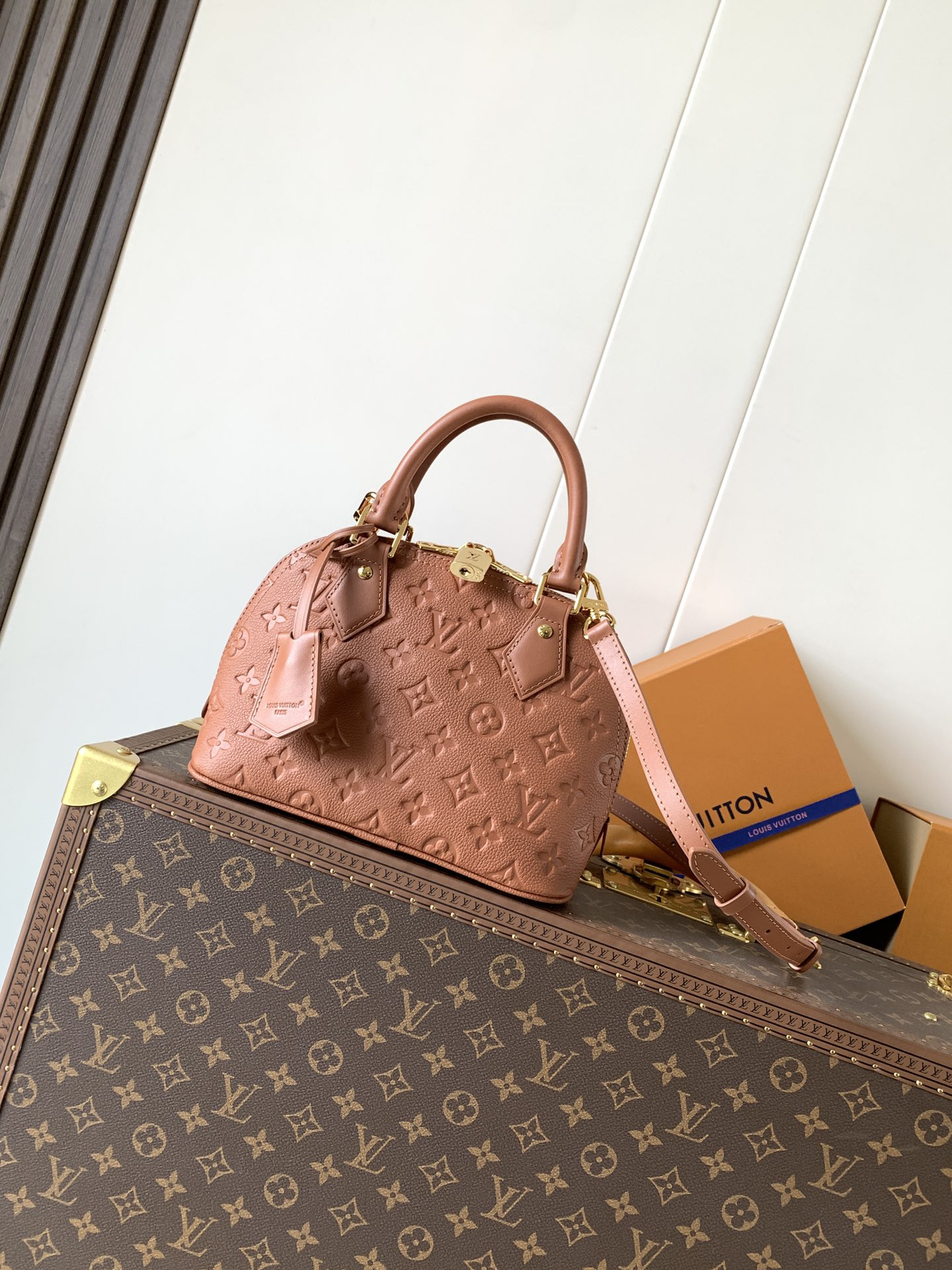 Louis Vuitton This Alma BB handbag showcases the iconic Alma BB silhouette, crafted from the House's exceptionally soft Monogram Empreinte leather.