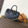 Louis Vuitton This Speedy Bandoulière 25 handbag is crafted from cowhide leather, offering a pillow-like soft touch.