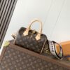 Louis Vuitton Drawing inspiration from the House's classics, the Sedy Bandoulière 20 handbag features cowhide leather trim accenting its Monogram canvas.