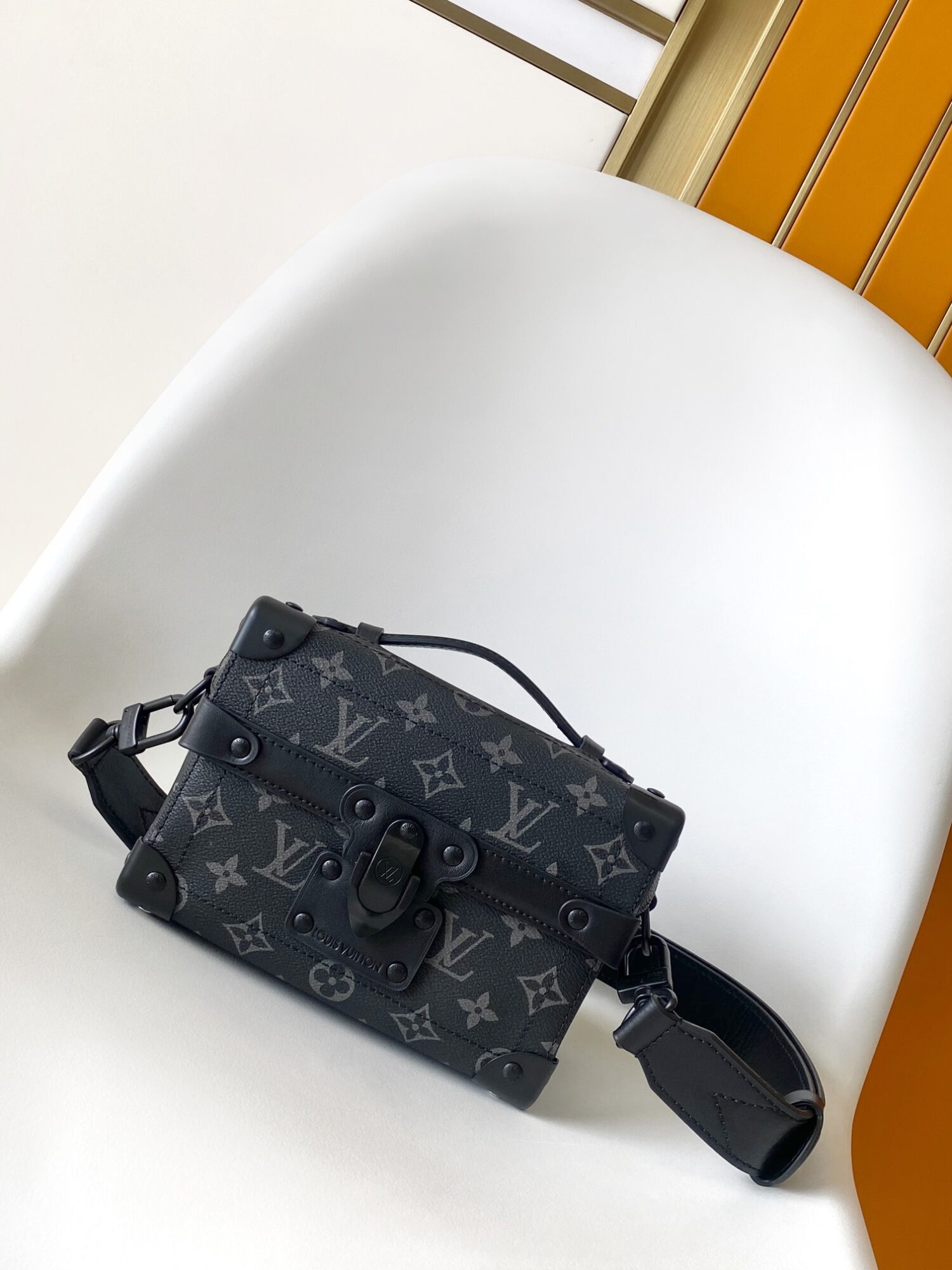 Louis Vuitton This Soul Trunk handbag is crafted from Monogram Eclipse canvas.